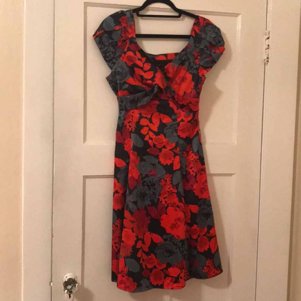 Multi-colored floral print dress with belt.